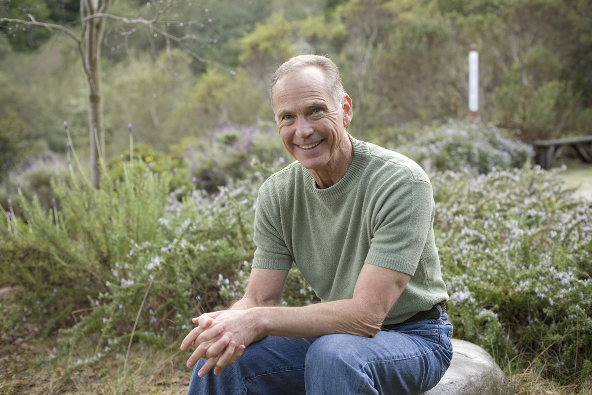 John Robbins Sitting and Smiling