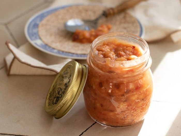 a glass jar of homemade relish or chutney
