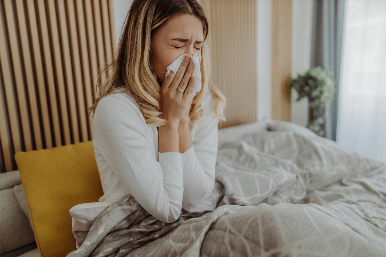 Woman with sore throat