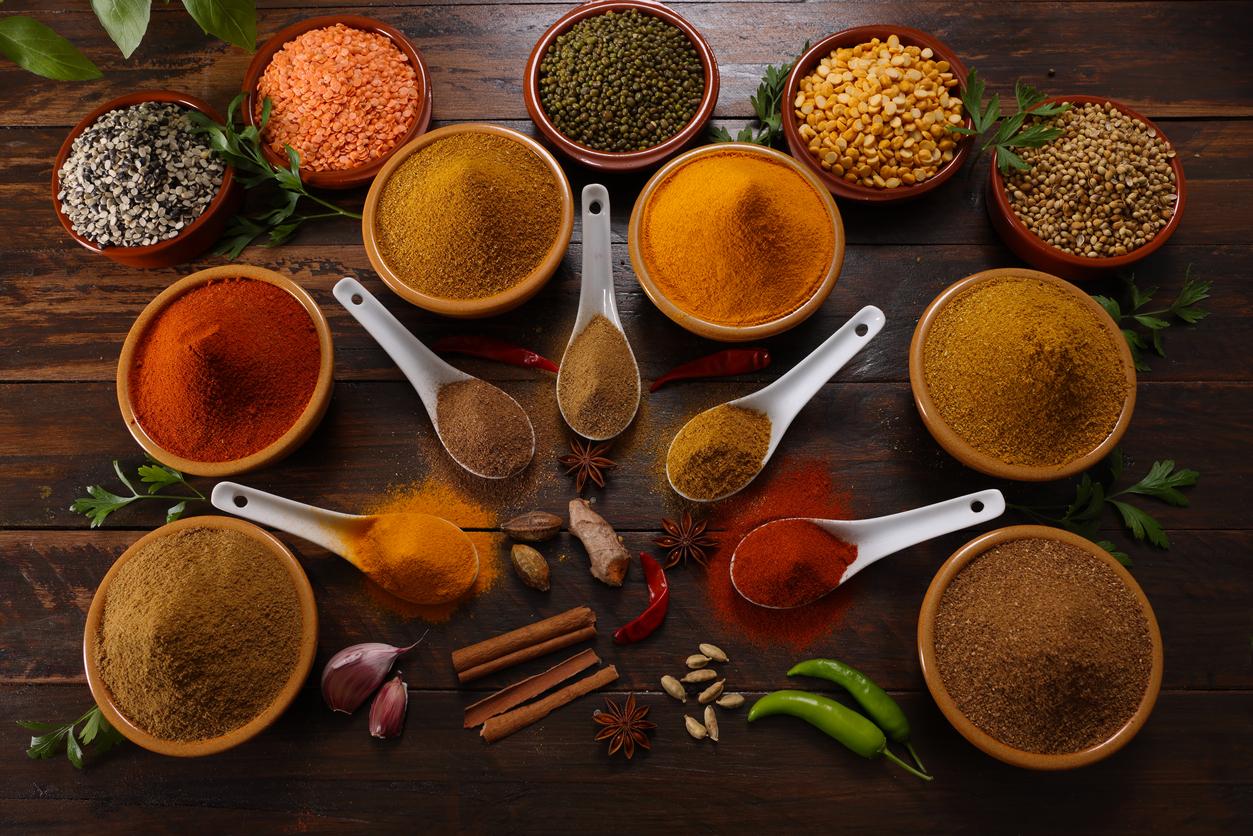 A selection of herbs and spices including Red and Green Chilli Turmeric Cumin Garam Masala making for savory cuisine