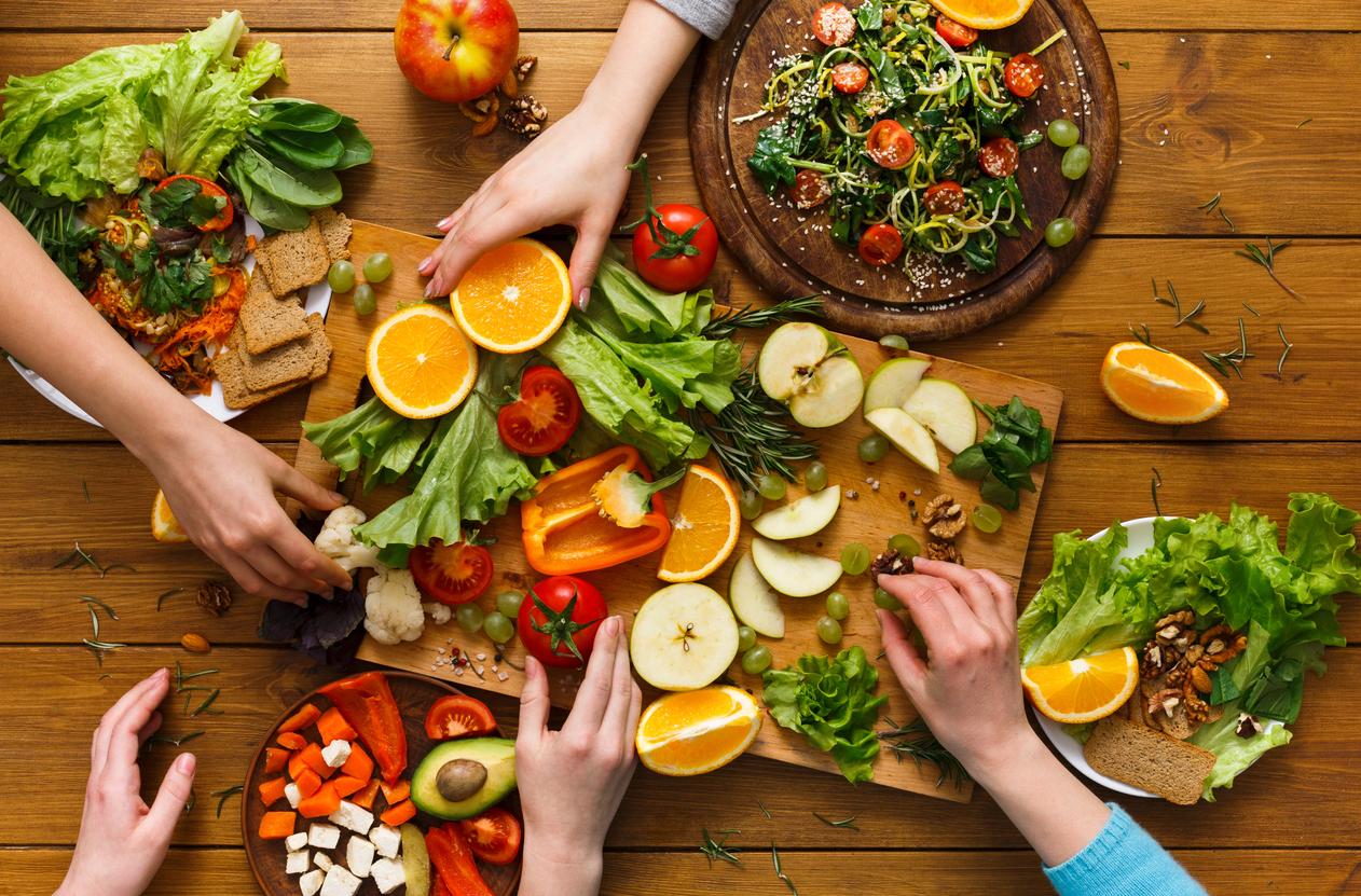 dinner table women eat healthy food at home kitchen