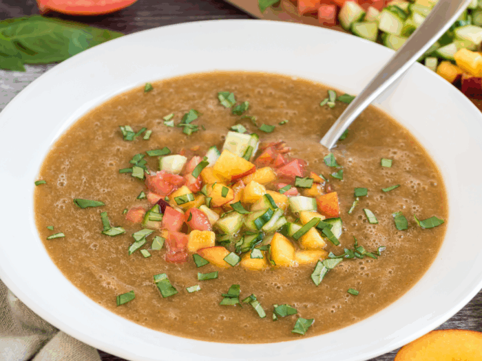 photo of healthy soup in a bowl with spoon